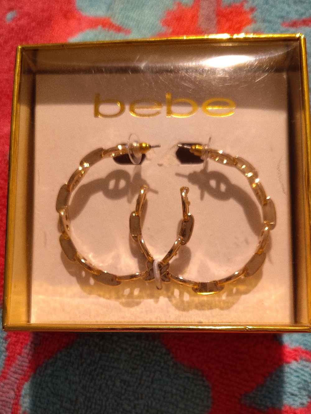 bebe Shiny Gold Textured Link Hoop Earrings